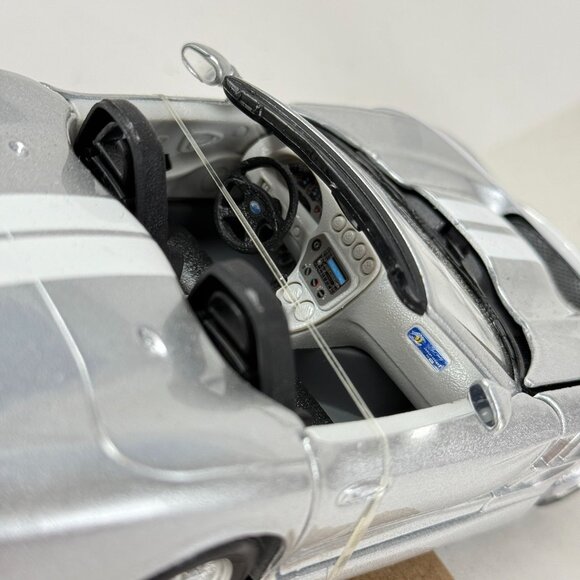 Maisto Premiere DC 1:24 Shelby Series One Silver Convertible w/ Box - Picture 2 of 9